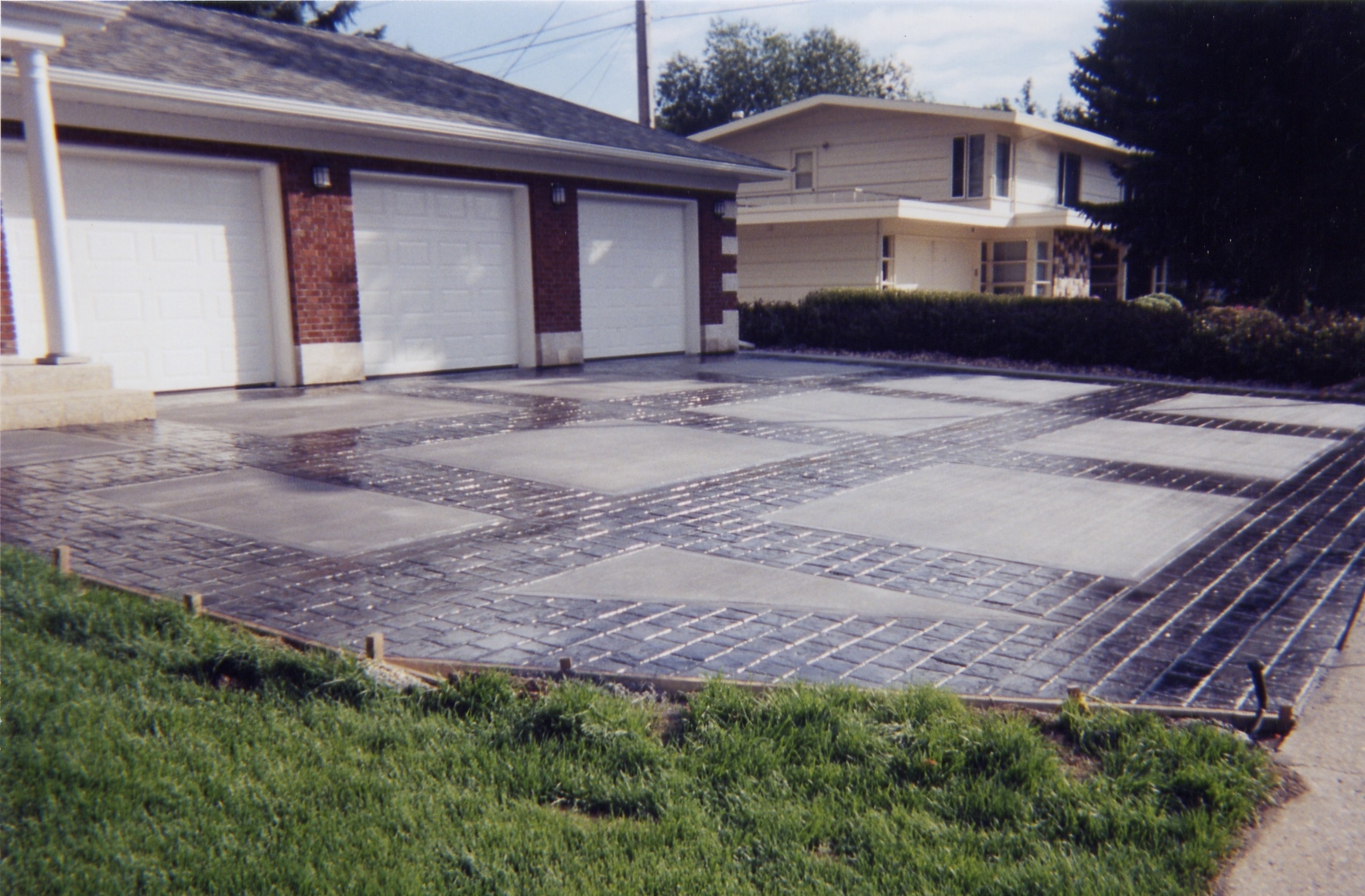 Stamped concrete driveway by River Valley Concrete