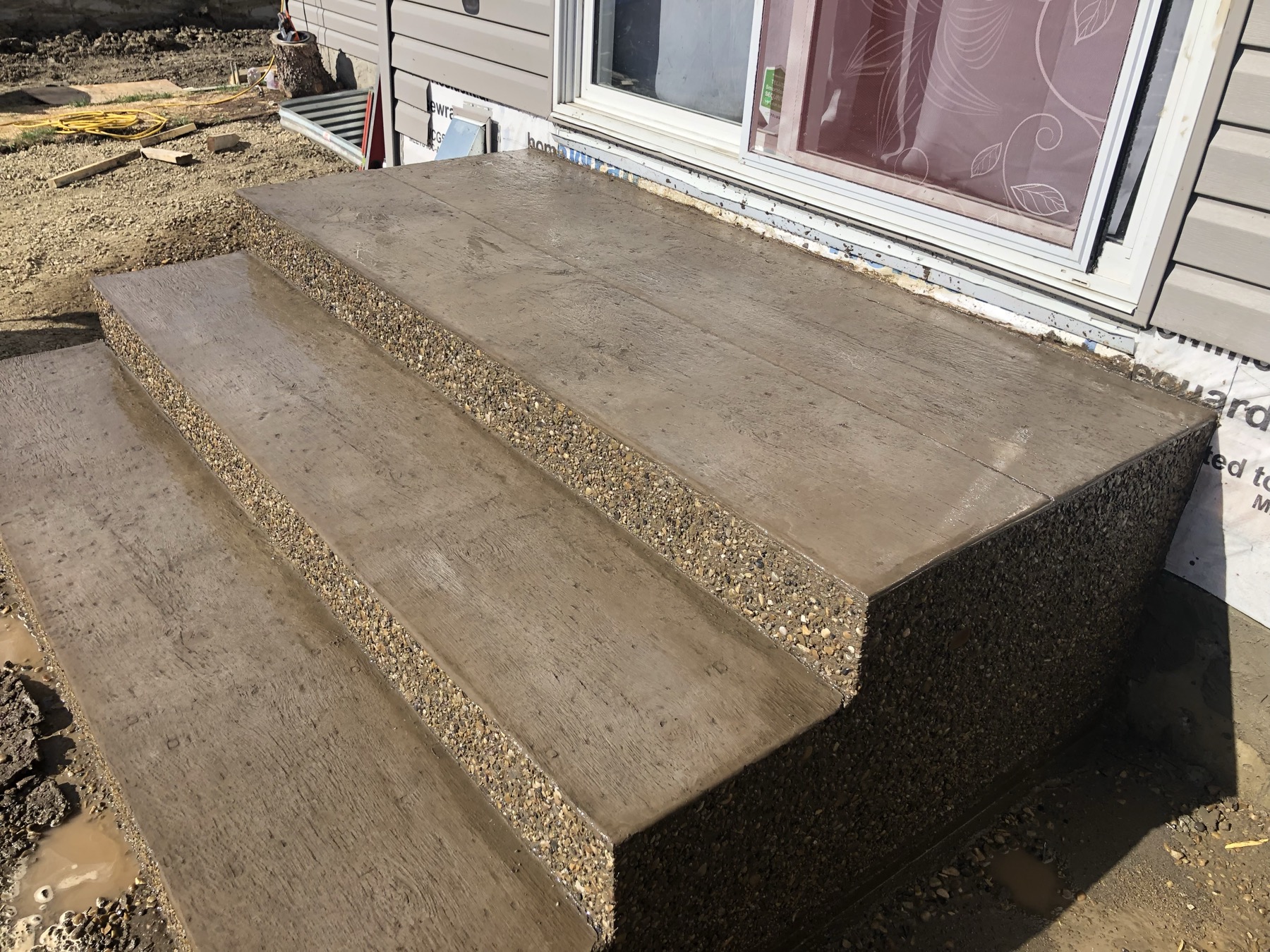 Wood-Plank Stamped Patio + Steps